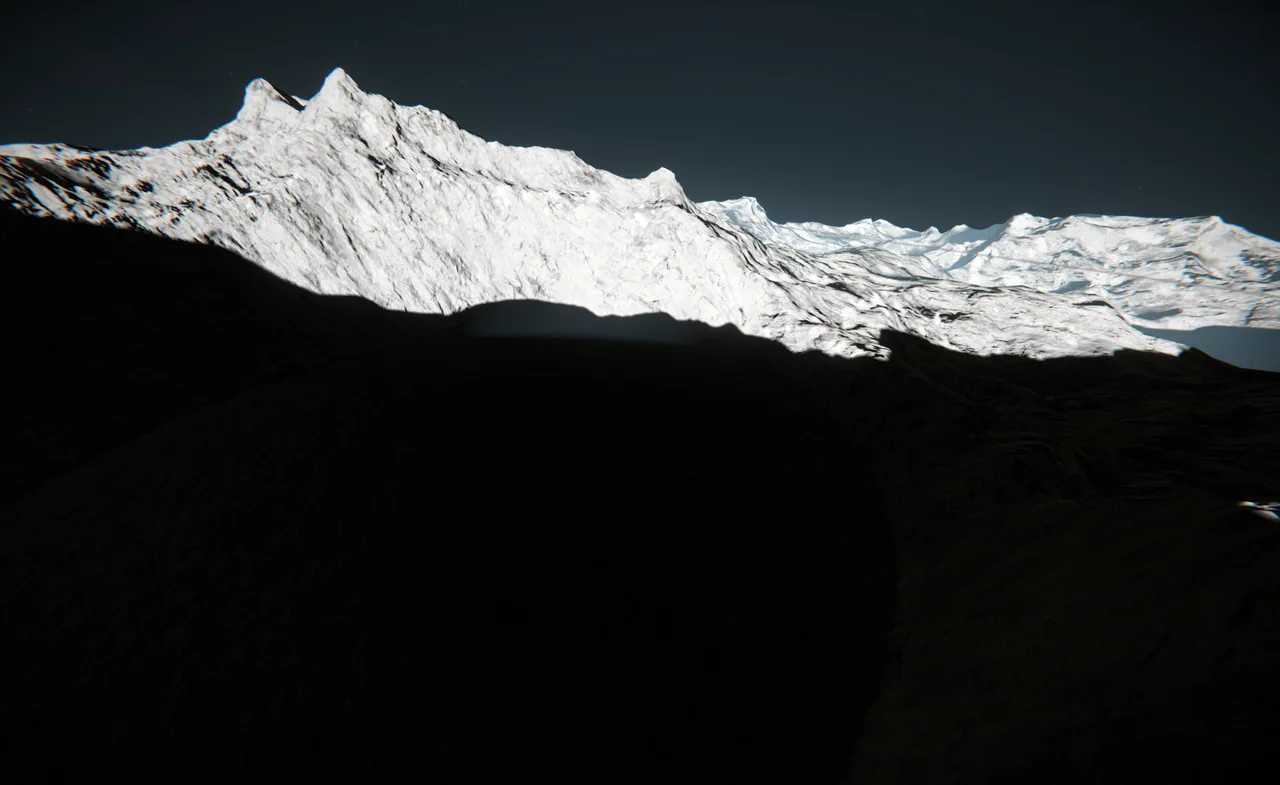 Sunlit white mountain ridges above deep shadow at Capture Zone G3 on Object-85